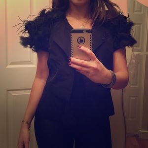 Stylish and sexy blazer with feathers